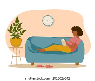 Pregnant woman with a big belly sits on the sofa and reads a book. Flat design. Vector illustration.