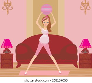 pregnant woman doing exercises with a ball