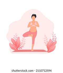 pregnant woman doing yoga tree pose