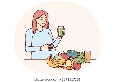 Pregnant woman drinks juice from fresh fruits and vegetables standing near steel with healthy food with vitamins. Pregnant girl is preparing to become mother and take care of unborn child