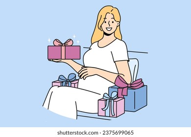 Pregnant woman with gift box strokes belly and looks at screen in anticipation of birth of baby. Pregnant girl is preparing to become mother and enjoys gifts from friends and relatives