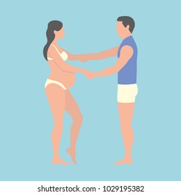 
pregnant woman and her husband holding hands on blue background