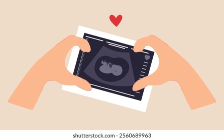 Pregnant woman holds a picture of an ultrasound examination of the fetus in her hands. ultrasound image of an unborn child. examination of a human fetus inside the uterus during pregnancy