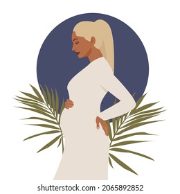 Pregnant woman with long hair on a background of leaves. The concept of pregnancy, motherhood, family. Happy mum. Pregnant belly side view. Pregnancy concept. Pregnant woman holds her belly. Modern