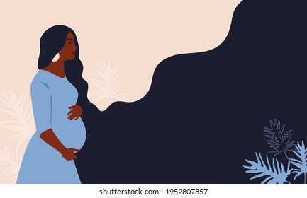 Pregnant woman on a background of leaves.The concept of pregnancy, motherhood, family. Happy mum. Pregnant belly side view. Pregnancy concept. Pregnant woman holds her belly. African american Pregnant