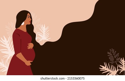 Pregnant woman on a background of leaves.The concept of pregnancy, motherhood, family. Happy mum. Pregnant belly side view. Pregnancy concept. Pregnant woman holds her belly. African american Pregnant