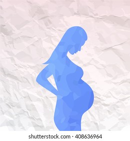 Pregnant woman on a beautiful background. Waiting for a miracle.