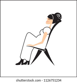 Pregnant woman on a chair