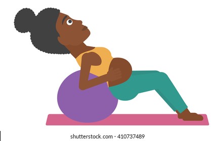 Pregnant woman on gymnastic ball.