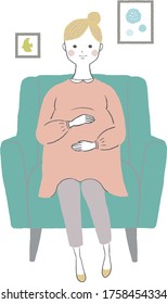 
Pregnant woman relaxing on the sofa