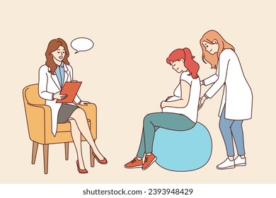 Pregnant woman undergoes courses for expectant mothers or is examined by obstetrician, sits on inflatable fitness ball. Pregnant girl listens to recommendations from medical workers - Shutterstock ID 2393948429
