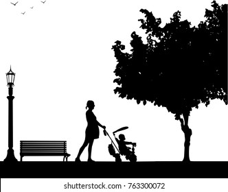 Pregnant woman walking with baby in tricycle  in park