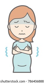 A pregnant woman wearing green clothes is cold.