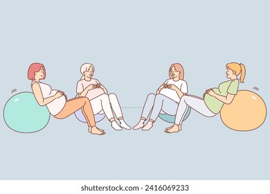 Pregnant women do fitball exercise during group classes to prepare for childbirth and improve health. Pregnant girls work out together in fitness club undergoing prenatal instruction