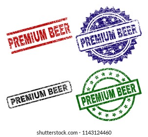 PREMIUM BEER seal stamps with distress texture. Black, green,red,blue vector rubber prints of PREMIUM BEER title with corroded texture. Rubber seals with round, rectangle, medal shapes.