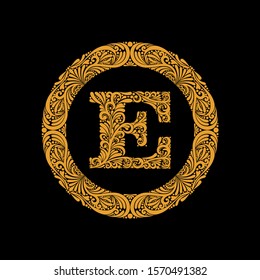 Premium, elegant capital letter E in a round frame is made of floral ornament. Baroque style.Elegant capital letters set 1 in the style of the Baroque.