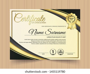 premium golden black certificate template design.