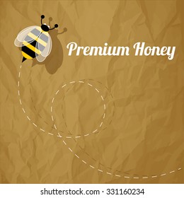 Premium Honey Bee on a crumpled paper brown background.