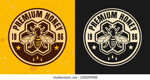 Premium honey two colored styles vector emblem, badge, label or logo on yellow and dark background