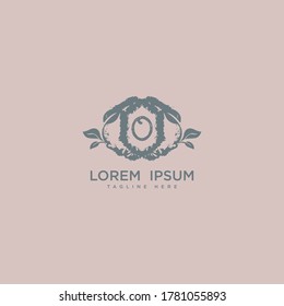 Diseño de icono de logotipo O de letra premium. 
Arreglo de matrimonio. Diseño de ramo floral, marco botánico, logotipo del borde de la gema dibujado a mano