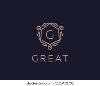 Premium linear shield monogram letter G logotype. Elegant crest leaf stamp icon vector logo. Luxury alphabet frame symbol. 