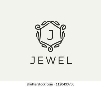 Premium linear shield monogram letter J logotype. Elegant crest leaf stamp icon vector logo. Luxury alphabet frame symbol. 