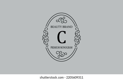 Premium monogram with the letter C. Frame with ornament. Luxury logo design with minimal modern font.