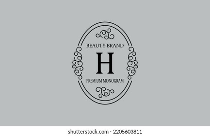 Premium monogram with the letter H. Frame with ornament. Luxury logo design with minimal modern font.