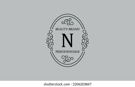 Premium monogram with the letter N. Frame with ornament. Luxury logo design with minimal modern font.