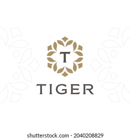 Logo de las iniciales T de la letra monograma premium. Diseño de icono de símbolo universal. Logotipo de lujo de hojas de abc.