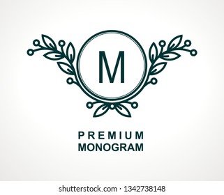 Premium monogram template for your emblems, logos, chevrons, labels. Floral ornament. Fancy wreath. Leaf vector frame