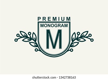 Premium monogram template for your emblems, logos, chevrons, labels. Floral ornament. Fancy wreath. Leaf vector frame