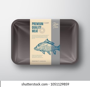 Premium Quality Carp. Abstract Vector Fish Plastic Tray with Cellophane Cover Packaging Design Label. Modern Typography and Hand Drawn Carp Silhouette Background Layout. Isolated.