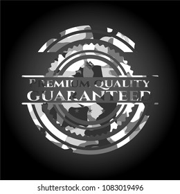  Premium Quality Guaranteed written on a grey camouflage texture