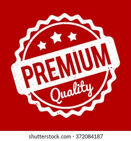 Premium Quality rubber stamp white on a red background.