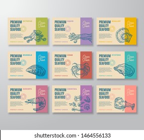 Premium Quality Seafood Labels Set. Abstract Vector Packaging Design. Modern Typography and Hand Drawn Crab, Shrimp, Molluscs and Squid Sketch Silhouettes Background Layouts with Soft Shadows Isolated