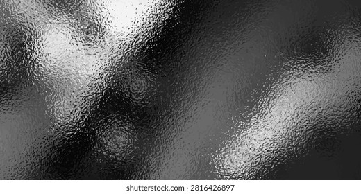 Premium silver hammered metal texture background featuring a realistic foil effect with intricate light-reflective dimples
