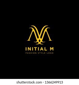 Premium Vector M Logo in gold color. Beautiful Logotype design for luxury company fashion branding