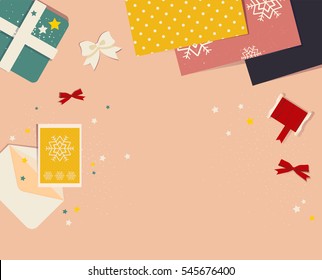 Preparing for Christmas banner, top view with gift boxes, ribbons, stars and Christmas gift card. Place for text at center. Happy new year and Merry Christmas concept.