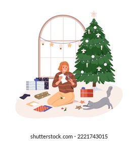 Preparándose para las vacaciones navideñas en un acogedor hogar. Chica con decoración de papel festivo DIY para Navidad. Mujer y gato durante los preparativos de Año Nuevo. Ilustración vectorial plana aislada en fondo blanco