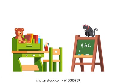 Preschool Classroom Interior Design Education Desk, Chair And Blackboard. Kid Room Decoration And Furniture With Books & Toys. Cat Sitting On Green Board And Licking. Flat Vector Isolated Illustration