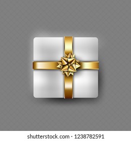 Present box with golden ribbon 