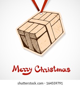 Present box paper label on ribbon. Christmas and New year design element