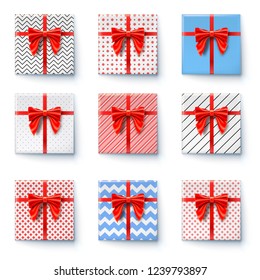 Present boxes with red ribbon and big bow isolated on white. Flat lay, top view on gift boxes wrapped in paper of various colors with patterns. Set of icons for holidays. Vector illustration.