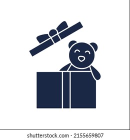 Present glyph icon. Gift box with teddy bear inside. Birthday congratulation, surprise in box. Celebration. Gift box concept. Filled flat sign. Isolated silhouette vector illustration
