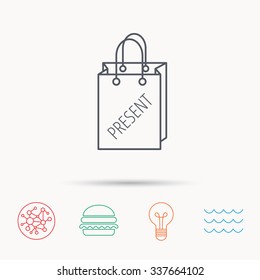 Present shopping bag icon. Gift handbag sign. Global connect network, ocean wave and burger icons. Lightbulb lamp symbol.