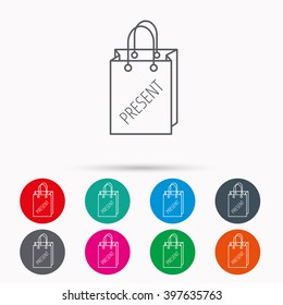 Present shopping bag icon. Gift handbag sign. Linear icons in circles on white background.
