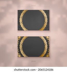 Präsentierbare Visitenkarte in Schwarz mit abstrakten Goldverzierungen für Ihr Unternehmen.