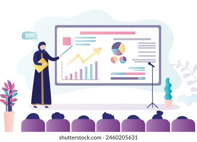 Presentation or financial literacy course. Arabic woman, business trainer talking about proper personal budgeting. Calculation of income and expenses, money management. Viewers at conference hall.