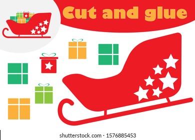 Presents in sleigh, christmas education game for the development of preschool children, use scissors and glue to create the applique, cut parts of image and glue on the paper, vector illustration